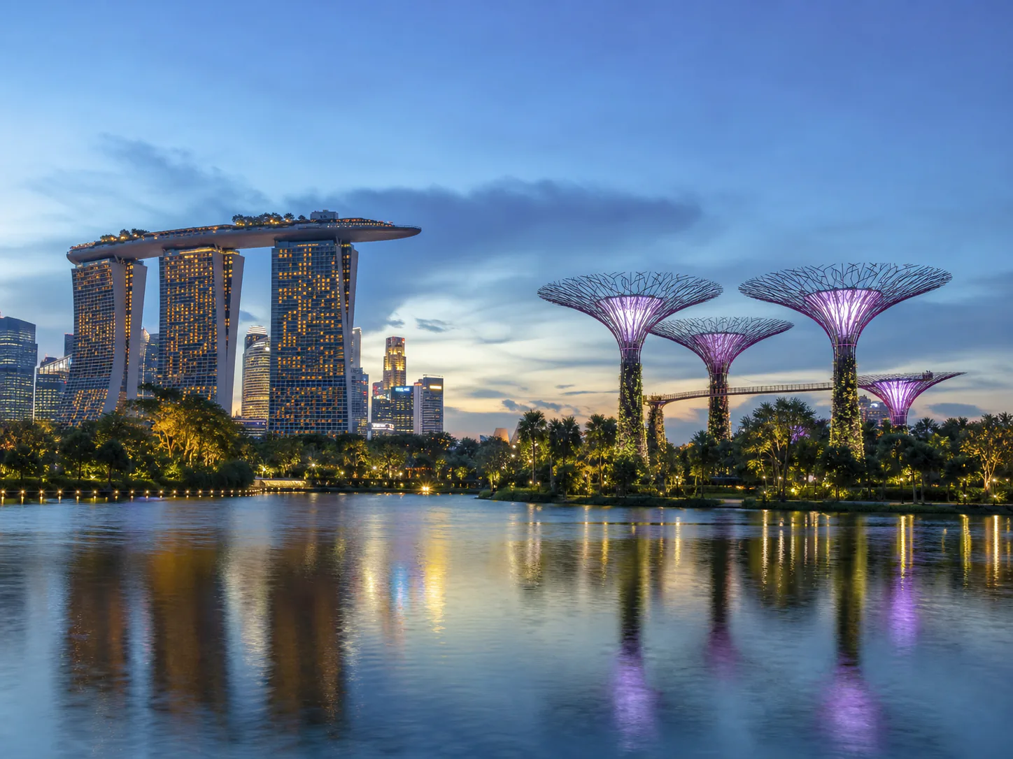 Marina Bay and Gardens by the Bay at blue hour in Singapore